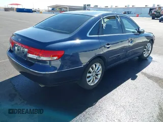 2007 Hyundai Azera SE z VIN KMHFC46F77A153141, wystawiony jako IAAI lot #41731777 z przebiegiem Nie podano mil oraz . Historia ofert i sprzedaży dostępna na DreamBid. Obrazek 4.