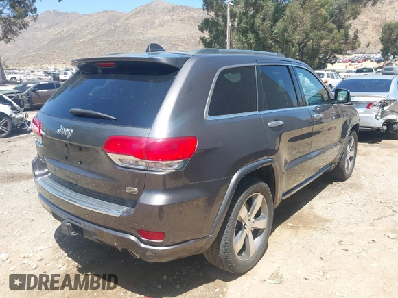 2015 Jeep Grand Cherokee Overland with VIN 1C4RJFCG7FC839778, listed as a IAAI auction lot 42490111 with 160,040 mi miles and . Bid and sale history available at DreamBid. Image 4.