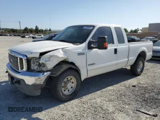 2003 Ford F-250 XL with VIN 1FTNX20P13EC01844, listed as a Copart auction lot 57885055 with 214,023 mi miles and Salvage title. Bid and sale history available at DreamBid. Image 1.