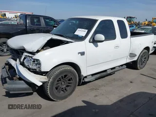 2003 Ford F-150 XL with VIN 1FTRX07L83KB50711, listed as a IAAI auction lot 41832990 with 201,328 mi miles and . Bid and sale history available at DreamBid. Image 2.
