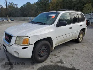 2005 GMC Envoy SLE with VIN 1GKDS13S252143336, listed as a Copart auction lot 84329494 with 0 mi miles and Salvage Title. Bid and sale history available at carsss.com. Image 1.