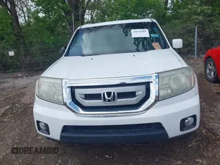 2011 Honda Pilot EX-L with VIN 5FNYF4H58BB085635, listed as a IAAI auction lot 42114205 with 218,399 mi miles. Bid and sale history available at carsss.com. Image 6.