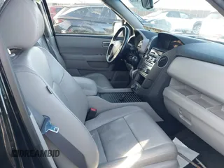 2012 Honda Pilot Touring with VIN 5FNYF4H93CB077057, listed as a IAAI auction lot 41156160 with 139,834 mi miles and . Bid and sale history available at DreamBid. Image 5.