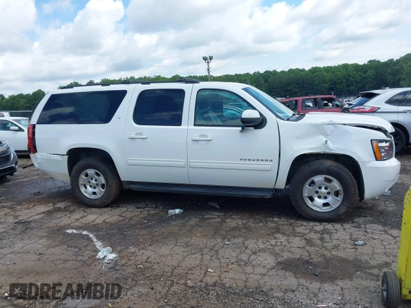 2014 Chevrolet Suburban LT with VIN 1GNSCJE07ER211222, listed as a IAAI auction lot 42428084 with 214,712 mi miles and . Bid and sale history available at DreamBid. Image 13.