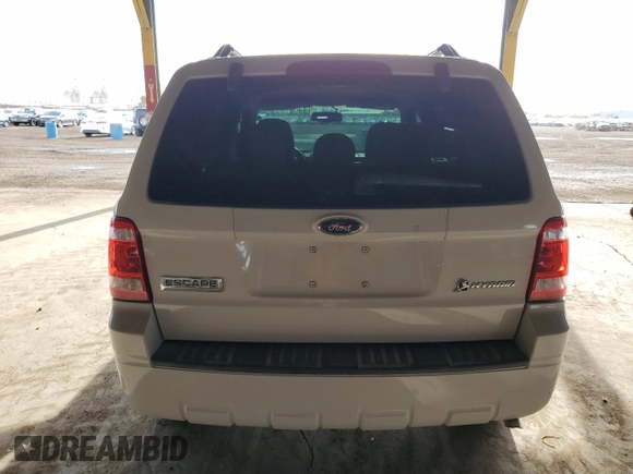 2009 Ford Escape Hybrid z VIN 1FMCU49389KB29641, wystawiony jako Copart lot #51164235 z przebiegiem 131 596 mil mil oraz Szkoda całkowita • Salvage title. Historia ofert i sprzedaży dostępna na DreamBid. Obrazek 6.