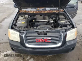 2003 GMC Envoy SLE with VIN 1GKDS13S632226264, listed as a Copart auction lot 82461694 with Not Provided miles and Clean Title. Bid and sale history available at carsss.com. Image 12.
