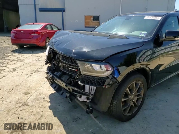 2017 Dodge Durango R/T with VIN 1C4SDJCT8HC961142, listed as a Copart auction lot 54534965 with 67,304 mi miles and Salvage title. Bid and sale history available at DreamBid. Image 15.