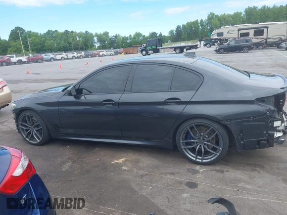 2018 BMW 5 Series M550i xDrive with VIN WBAJB9C56JB035364, listed as a IAAI auction lot 42179145 with 112,123 mi miles and . Bid and sale history available at DreamBid. Image 15.