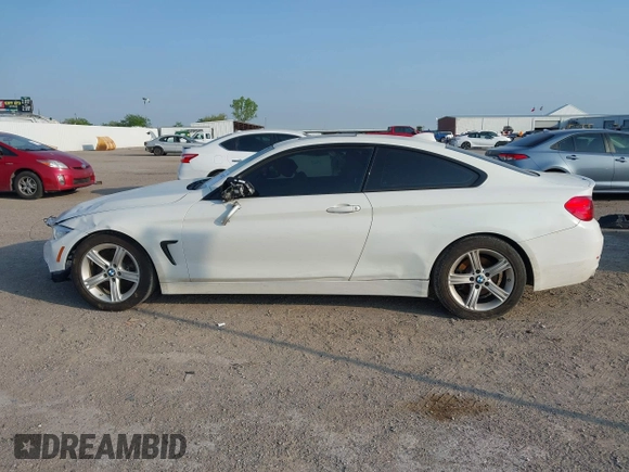 2015 BMW 4 Series 428i z VIN WBA3N7C58FK224500, wystawiony jako IAAI lot #42044727 z przebiegiem 71 815 mil mil oraz . Historia ofert i sprzedaży dostępna na DreamBid. Obrazek 14.