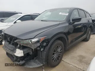 2021 Mazda CX-5 Touring z VIN JM3KFBCM8M0321766, wystawiony jako Copart lot #52845085 z przebiegiem 115 627 mil mil oraz Szkody całkowita. Historia ofert i sprzedaży dostępna na DreamBid. Obrazek 1.