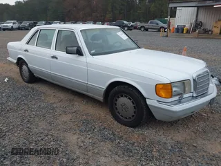 1989 Mercedes-Benz 420 Series 420SEL with VIN WDBCA35E4KA456613, listed as a IAAI auction lot 41145650 with 199,599 mi miles. Bid and sale history available at carsss.com. Image 1.