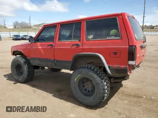 1999 Jeep Cherokee Sport with VIN 1J4FF68S6XL574980, listed as a Copart auction lot 51639635 with 257,854 mi miles and Salvage Title. Bid and sale history available at carsss.com. Image 2.