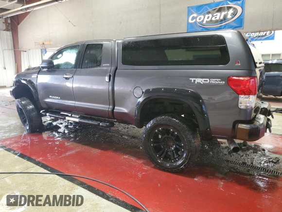 2011 Toyota Tundra 4WD Truck LTD with VIN 5TFBY5F15BX196980, listed as a Copart auction lot 51797675 with 124,080 mi miles and Salvage Title. Bid and sale history available at carsss.com. Image 2.