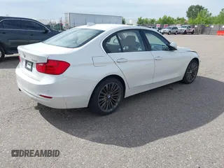 2013 BMW 3 Series 328i xDrive with VIN WBA3B5C52DF599074, listed as a IAAI auction lot 42408547 with 158,050 mi miles and . Bid and sale history available at DreamBid. Image 4.