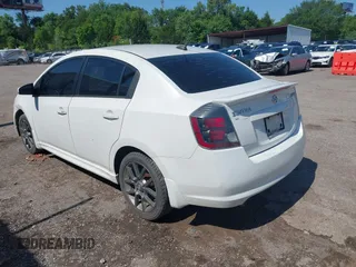 2012 Nissan Sentra SE-R z VIN 3N1BB6AP2CL670385, wystawiony jako IAAI lot #42431771 z przebiegiem 186 513 mil mil oraz . Historia ofert i sprzedaży dostępna na DreamBid. Obrazek 3.