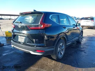2021 Honda CR-V LX with VIN 2HKRW1H26MH414264, listed as a IAAI auction lot 41316244 with 65,769 mi miles. Bid and sale history available at carsss.com. Image 4.