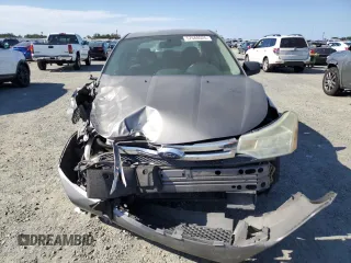 2009 Ford Focus SE z VIN 1FAHP35N59W148326, wystawiony jako Copart lot #57688025 z przebiegiem Nie podano mil oraz Szkoda całkowita • Salvage title. Historia ofert i sprzedaży dostępna na DreamBid. Obrazek 5.