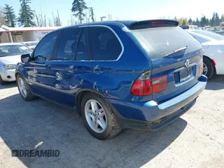 2001 BMW X5 4.4i with VIN WBAFB33521LH13219, listed as a IAAI auction lot 42029117 with 163,058 mi miles. Bid and sale history available at carsss.com. Image 3.