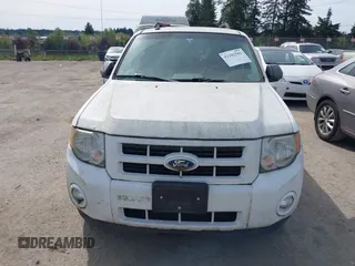 2010 Ford Escape Hybrid with VIN 1FMCU4K35AKC14385, listed as a IAAI auction lot 42182581 with 115,974 mi miles and . Bid and sale history available at DreamBid. Image 6.