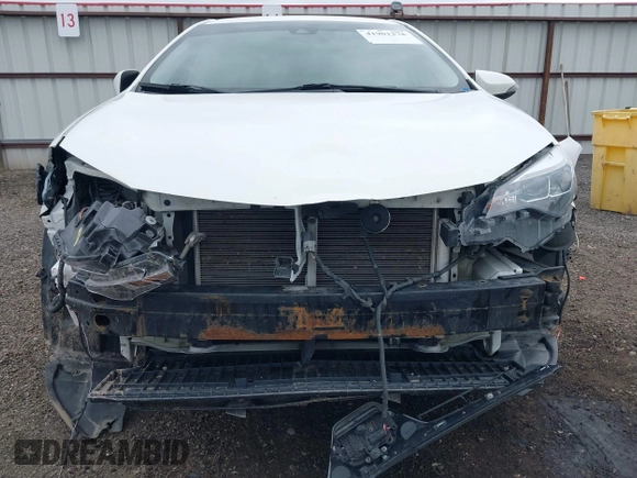 2019 Toyota Corolla L with VIN 5YFBURHE1KP937059, listed as a IAAI auction lot 41901278 with 98,796 mi miles and . Bid and sale history available at DreamBid. Image 6.