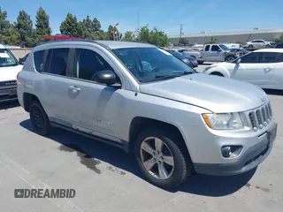 2011 Jeep Compass Latitude with VIN 1J4NF1FB6BD218694, listed as a IAAI auction lot 42192167 with 155,012 mi miles. Bid and sale history available at carsss.com. Image 1.