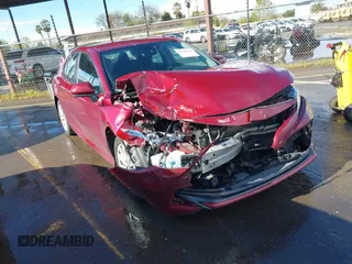2020 Toyota Camry LE with VIN 4T1C11AK4LU916494, listed as a IAAI auction lot 41786429 with 100,032 mi miles and . Bid and sale history available at DreamBid. Image 1.