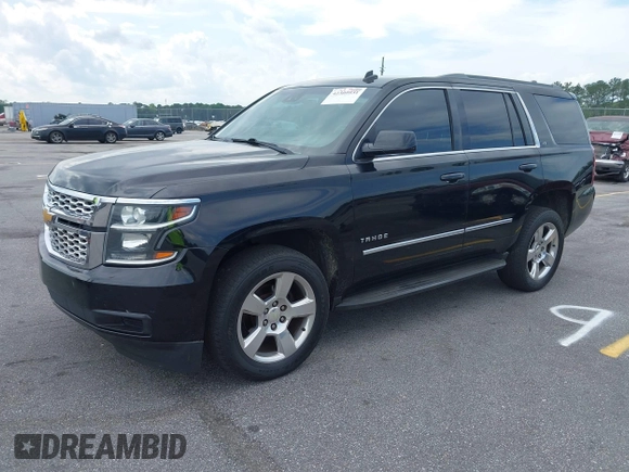 2015 Chevrolet Tahoe LT with VIN 1GNSCBKC4FR145119, listed as a IAAI auction lot 42309931 with 99,408 mi miles and . Bid and sale history available at DreamBid. Image 2.