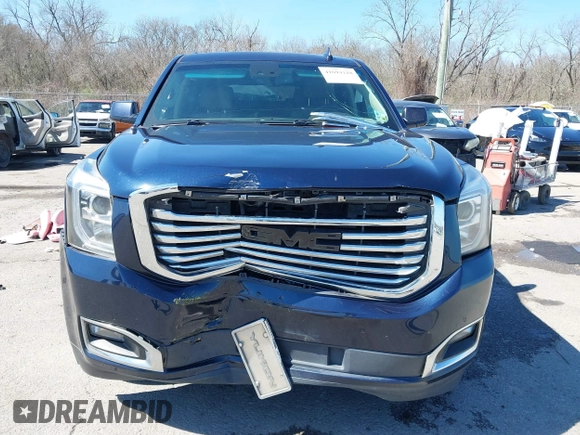 2017 GMC Yukon SLT with VIN 1GKS1BKC9HR356600, listed as a IAAI auction lot 41694218 with 155,855 mi miles. Bid and sale history available at carsss.com. Image 12.