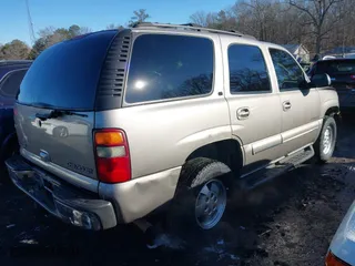 2003 Chevrolet Tahoe LS with VIN 1GNEC13Z03J145204, listed as a IAAI auction lot 41355337 with 245,498 mi miles. Bid and sale history available at carsss.com. Image 4.
