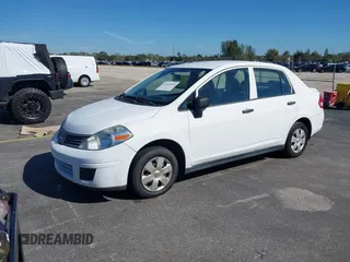 2010 Nissan Versa 1.6 with VIN 3N1CC1AP2AL377412, listed as a IAAI auction lot 41420948 with 127,643 mi miles. Bid and sale history available at carsss.com. Image 2.