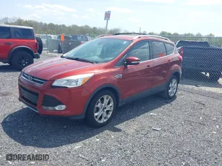 2015 Ford Escape Titanium with VIN 1FMCU0JX5FUB77475, listed as a IAAI auction lot 42103388 with 113,018 mi miles. Bid and sale history available at carsss.com. Image 2.