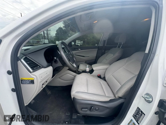 2018 Hyundai Tucson SEL Plus z VIN KM8J33A40JU676727, wystawiony jako Copart lot #59302255 z przebiegiem 128 559 mil mil oraz Czysty tytuł • Clean title. Historia ofert i sprzedaży dostępna na DreamBid. Obrazek 5.