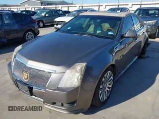 2012 Cadillac CTS Luxury z VIN 1G6DF5E58C0142041, wystawiony jako IAAI lot #42235864 z przebiegiem 59 697 mil mil oraz . Historia ofert i sprzedaży dostępna na DreamBid. Obrazek 2.