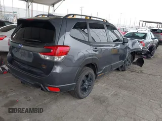 2023 Subaru Forester Wilderness with VIN JF2SKAMC4PH412075, listed as a IAAI auction lot 41885690 with 29,935 mi miles and . Bid and sale history available at DreamBid. Image 4.