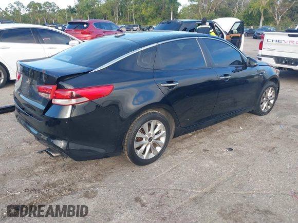2018 Kia Optima LX with VIN 5XXGT4L38JG256924, listed as a IAAI auction lot 41267413 with 129,820 mi miles and . Bid and sale history available at DreamBid. Image 4.