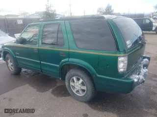 1999 Oldsmobile Bravada with VIN 1GHDT13W7X2711363, listed as a IAAI auction lot 41294782 with 198,508 mi miles. Bid and sale history available at carsss.com. Image 3.