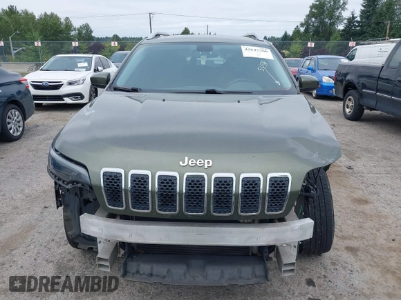 2019 Jeep Cherokee Latitude Plus z VIN 1C4PJMLB2KD191884, wystawiony jako IAAI lot #42647360 z przebiegiem 148 680 mil mil oraz . Historia ofert i sprzedaży dostępna na DreamBid. Obrazek 13.