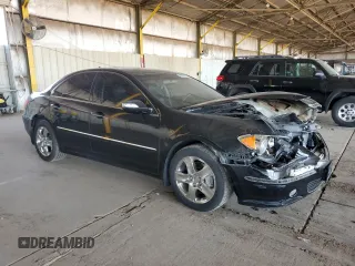 2005 Acura RL z VIN JH4KB16575C011187, wystawiony jako Copart lot #60276655 z przebiegiem 107 378 mil mil oraz Szkoda całkowita • Salvage title. Historia ofert i sprzedaży dostępna na DreamBid. Obrazek 4.