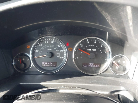 2010 Jeep Commander Sport z VIN 1J4RH4GK3AC158874, wystawiony jako IAAI lot #41708167 z przebiegiem 165 002 mil mil oraz . Historia ofert i sprzedaży dostępna na DreamBid. Obrazek 7.