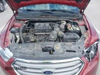2014 Ford Taurus SEL z VIN 1FAHP2E82EG157445, wystawiony jako IAAI lot #42133676 z przebiegiem 174 616 mil mil oraz . Historia ofert i sprzedaży dostępna na DreamBid. Obrazek 10.