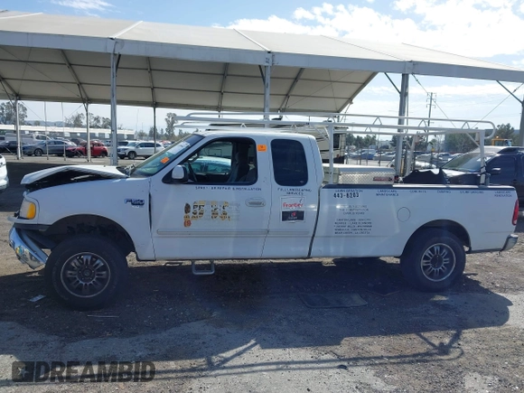 2002 Ford F-150 XL with VIN 1FTRX17L82NA54581, listed as a IAAI auction lot 41698662 with 220,321 mi miles. Bid and sale history available at carsss.com. Image 14.
