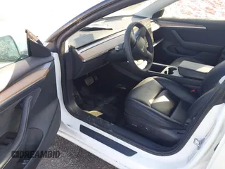 2021 Tesla Model 3 Long Range with VIN 5YJ3E1EB0MF992792, listed as a IAAI auction lot 41726740 with 33,507 mi miles. Bid and sale history available at carsss.com. Image 5.