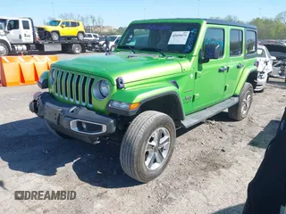 2019 Jeep Wrangler Unlimited Sahara with VIN 1C4HJXEN1KW592876, listed as a IAAI auction lot 42039474 with 66,506 mi miles and . Bid and sale history available at DreamBid. Image 18.