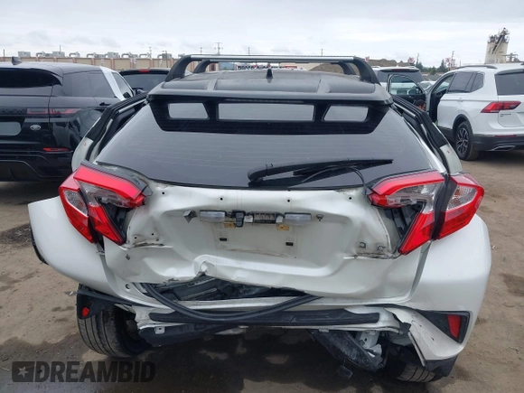 2020 Toyota C-HR LE with VIN JTNKHMBX9L1092934, listed as a IAAI auction lot 42021972 with 56,777 mi miles and . Bid and sale history available at DreamBid. Image 16.