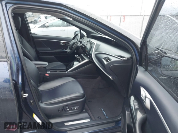 2016 Toyota Mirai with VIN JTDBVRBD6GA000989, listed as a IAAI auction lot 41978253 with 63,682 mi miles and . Bid and sale history available at DreamBid. Image 5.