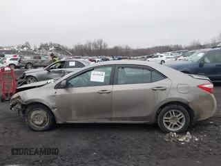 2015 Toyota Corolla L z VIN 2T1BURHE0FC468259, wystawiony jako IAAI lot #41559030 z przebiegiem 299 557 mil mil oraz . Historia ofert i sprzedaży dostępna na DreamBid. Obrazek 14.