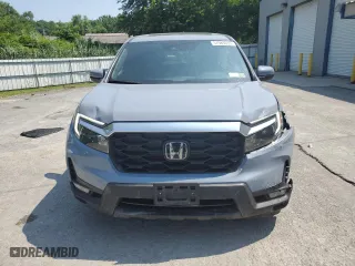 2022 Honda Passport EX-L with VIN 5FNYF8H52NB023451, listed as a Copart auction lot 57983053 with 10,103 mi miles. Bid and sale history available at carsss.com. Image 5.