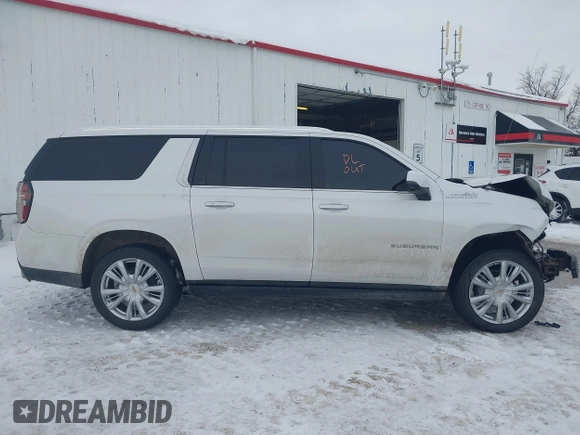 2022 Chevrolet Suburban High Country with VIN 1GNSKGKLXNR151036, listed as a IAAI auction lot 41549439 with 97,613 mi miles and . Bid and sale history available at DreamBid. Image 14.