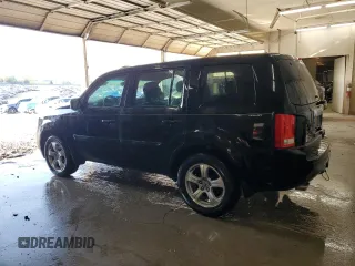 2014 Honda Pilot EX-L with VIN 5FNYF3H59EB027869, listed as a Copart auction lot 52512485 with 203,292 mi miles and Salvage Title. Bid and sale history available at carsss.com. Image 2.