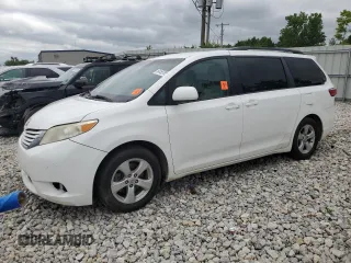 2015 Toyota Sienna LE AAS with VIN 5TDKK3DC2FS661818, listed as a Copart auction lot 64165795 with 171,702 mi miles and Clean title. Bid and sale history available at DreamBid. Image 1.
